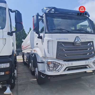 รถบรรทุกน้ำมันเชื้อเพลิง HOWO NX 8x4 ขนาด 30,000 ลิตร รถบรรทุกดีเซลสำหรับงานหนักสำหรับเหมืองแร่และการขนส่งน้ำมันเชื้อเพลิงในแซมเบีย